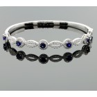 0.93 Cts Sapphire and Diamond Halo Bracelet set in 18K white gold 