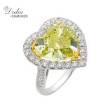 11.51 Cts Heart Shape Fancy Yellow Ring with Halo in 14K White Gold