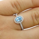 0.82 Cts  Oval Aquamarine and Diamond Engagement Ring set in 18K white gold