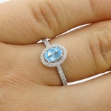 0.82 Cts  Oval Aquamarine and Diamond Engagement Ring set in 18K white gold
