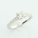 1.24 Ctw Four-Prong Round Cut Diamond Engagement Ring Set in 18K White Gold