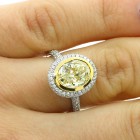 3.98 CTS OVAL FANCY YELLOW DIAMOND ENGAGEMENT RING SET IN 18K WHITE GOLD