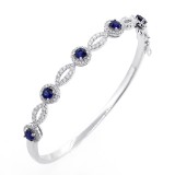 0.93 Cts Sapphire and Diamond Halo Bracelet set in 18K white gold 