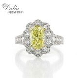 3.32 Cts Oval Cut Yellow Diamond Ring with Flower Shape halo set in 18K White Gold