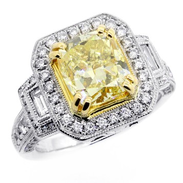 4.05 CTS FANCY YELLOW CUSHION CUT DIAMOND ENGAGEMENT RING SET IN 18K WHITE GOLD