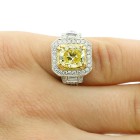 4.05 CTS FANCY YELLOW CUSHION CUT DIAMOND ENGAGEMENT RING SET IN 18K WHITE GOLD