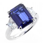 1.08 CTS TRAPEZ CUT DIAMOND RING WITH 5.38 CTS JADORE EMERALD CUT SET IN PLATINUM