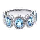 0.57CTS DIAMOND RING WITH OVAL BLUE GEM STONES OF 4.20 CTS SET IN 14K WHITE GOLD