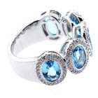 0.57CTS DIAMOND RING WITH OVAL BLUE GEM STONES OF 4.20 CTS SET IN 14K WHITE GOLD