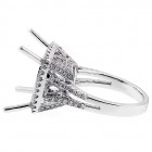 Cushion Halo Engagment Ring with approximatly .85 cts. set in 18kt white gold