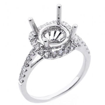 0.63 Cts diamond halo engagement ring set in 18 K white ring