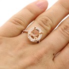 Oval halo diamond engagement ring setting set in 14 k pink gold