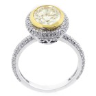 3.98 CTS OVAL FANCY YELLOW DIAMOND ENGAGEMENT RING SET IN 18K WHITE GOLD