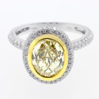 3.98 CTS OVAL FANCY YELLOW DIAMOND ENGAGEMENT RING SET IN 18K WHITE GOLD